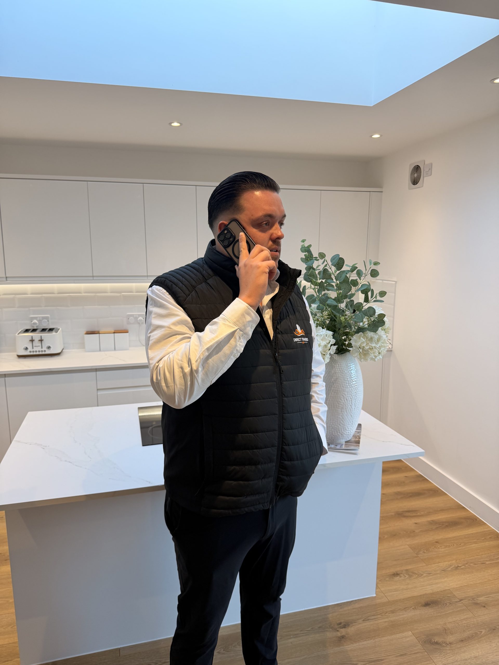 Direct Trades team member answering a client call for home improvement enquiries